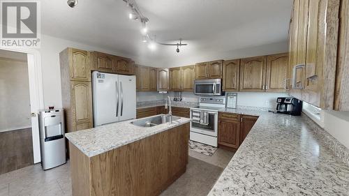 9024 114 Avenue, Fort St. John, BC - Indoor Photo Showing Kitchen With Double Sink