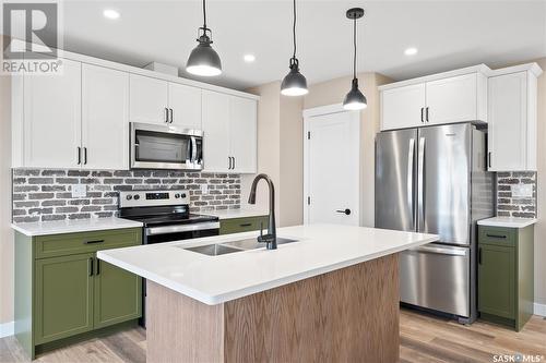 4845 Ferndale Crescent, Regina, SK - Indoor Photo Showing Kitchen With Double Sink With Upgraded Kitchen