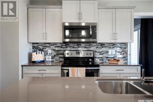 4845 Ferndale Crescent, Regina, SK - Indoor Photo Showing Kitchen With Double Sink With Upgraded Kitchen