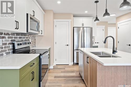 4845 Ferndale Crescent, Regina, SK - Indoor Photo Showing Kitchen With Double Sink With Upgraded Kitchen