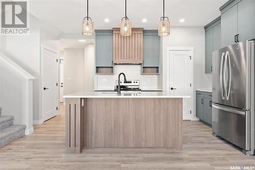 4837 Ferndale Crescent, Regina, SK - Indoor Photo Showing Kitchen With Double Sink With Upgraded Kitchen