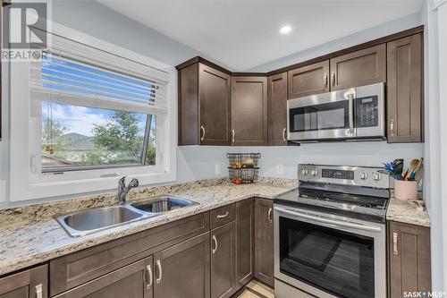 204 & 208 7Th Street, Humboldt, SK - Indoor Photo Showing Kitchen With Double Sink