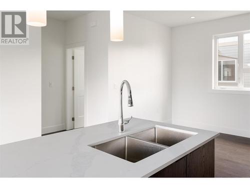 235 Taylor Road Unit# 2, Kelowna, BC - Indoor Photo Showing Kitchen With Double Sink