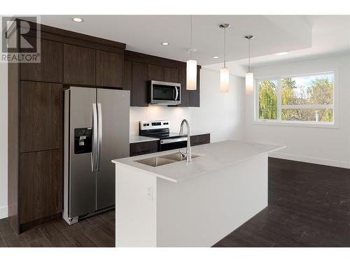 235 Taylor Road Unit# 2, Kelowna, BC - Indoor Photo Showing Kitchen With Stainless Steel Kitchen With Double Sink With Upgraded Kitchen