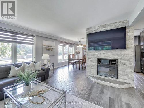 216 Gary Drive, Toronto (Humberlea-Pelmo Park), ON - Indoor Photo Showing Living Room With Fireplace