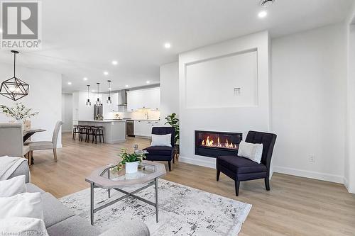 535 Isaac Street Unit# 103, South Bruce Peninsula, ON - Indoor Photo Showing Living Room With Fireplace