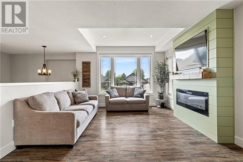 167 17Th Avenue A, Hanover, ON - Indoor Photo Showing Living Room With Fireplace