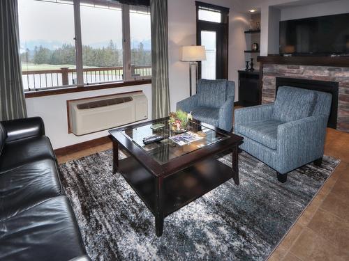 822A - 800 Bighorn Boulevard, Radium Hot Springs, BC - Indoor Photo Showing Living Room With Fireplace