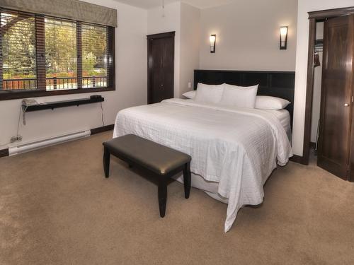 822A - 800 Bighorn Boulevard, Radium Hot Springs, BC - Indoor Photo Showing Bedroom