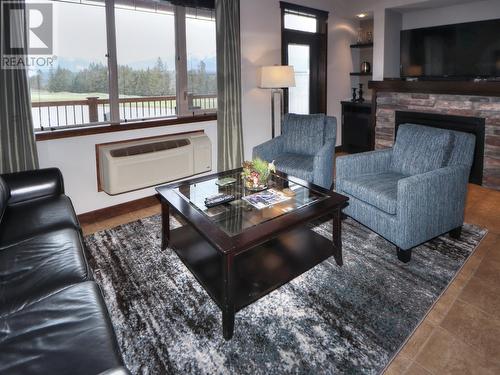 800 Bighorn Boulevard Unit# 822A, Radium Hot Springs, BC - Indoor Photo Showing Living Room With Fireplace