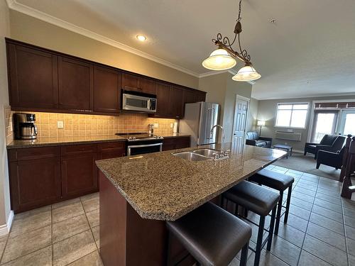 234C - 200 Bighorn Boulevard, Radium Hot Springs, BC - Indoor Photo Showing Kitchen With Double Sink With Upgraded Kitchen