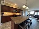 200 Bighorn Boulevard Unit# 234C, Radium Hot Springs, BC  - Indoor Photo Showing Kitchen With Double Sink With Upgraded Kitchen 