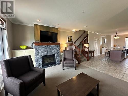 200 Bighorn Boulevard Unit# 234C, Radium Hot Springs, BC - Indoor Photo Showing Living Room With Fireplace