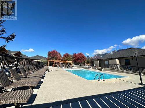 200 Bighorn Boulevard Unit# 234C, Radium Hot Springs, BC - Outdoor With In Ground Pool