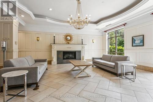 2718 - 700 Humberwood Boulevard, Toronto (West Humber-Clairville), ON - Indoor Photo Showing Living Room With Fireplace