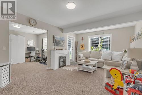 4943 Windsong Crescent, Kelowna, BC - Indoor Photo Showing Living Room With Fireplace