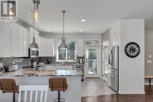 4943 Windsong Crescent, Kelowna, BC - Indoor Photo Showing Kitchen With Stainless Steel Kitchen With Double Sink With Upgraded Kitchen