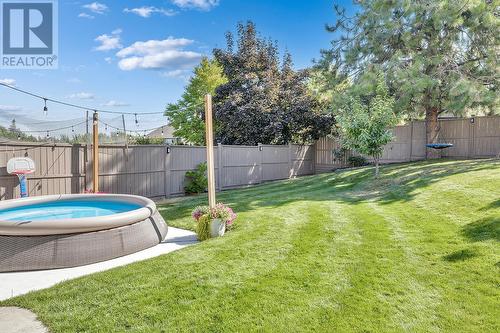 4943 Windsong Crescent, Kelowna, BC - Outdoor With Backyard