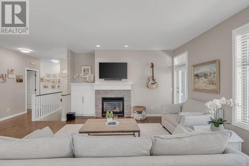 4943 Windsong Crescent, Kelowna, BC - Indoor Photo Showing Living Room With Fireplace