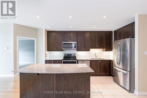 707 - 33 Ellen Street, Barrie (City Centre), ON - Indoor Photo Showing Kitchen With Double Sink With Upgraded Kitchen