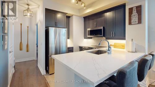 1001 - 2087 Lake Shore Boulevard W, Toronto (Mimico), ON - Indoor Photo Showing Kitchen With Upgraded Kitchen