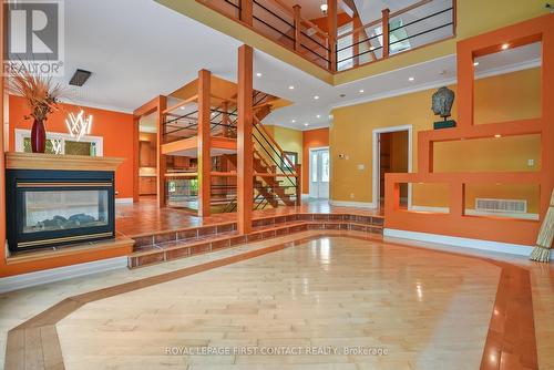 29 Glenhuron Drive, Springwater (Midhurst), ON - Indoor Photo Showing Other Room With Fireplace