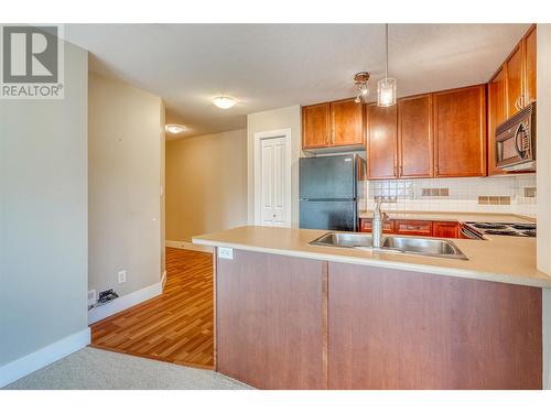 256 Hastings Avenue Unit# 212, Penticton, BC - Indoor Photo Showing Kitchen With Double Sink