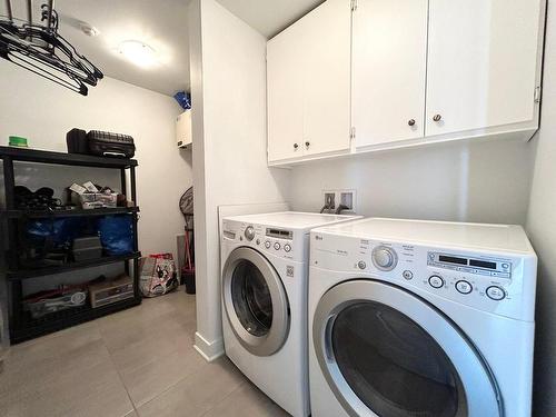 Salle de lavage - 102-130 Rue Des Aubépines, Vaudreuil-Dorion, QC - Indoor Photo Showing Laundry Room