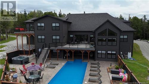 21 Khaki Court, Quispamsis, NB - Outdoor With In Ground Pool With Deck Patio Veranda