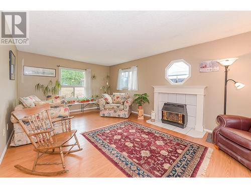 4420 Schubert Road, Spallumcheen, BC - Indoor Photo Showing Living Room With Fireplace