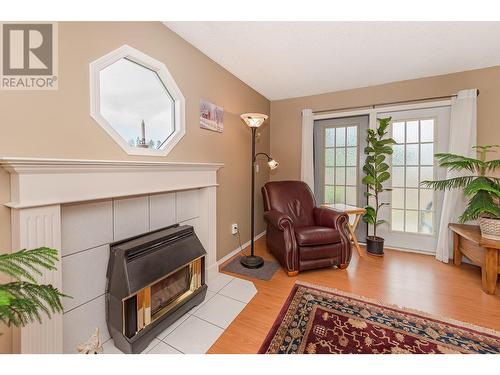 4420 Schubert Road, Spallumcheen, BC - Indoor Photo Showing Living Room With Fireplace