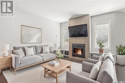 438 Secord Way, Saskatoon, SK - Indoor Photo Showing Living Room With Fireplace