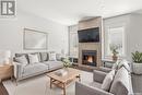 438 Secord Way, Saskatoon, SK  - Indoor Photo Showing Living Room With Fireplace 