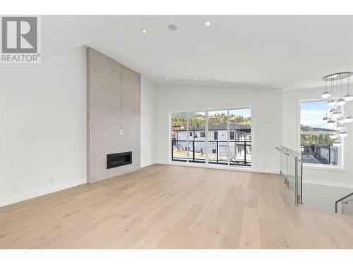 1955 Harris Drive, Penticton, BC - Indoor Photo Showing Living Room With Fireplace