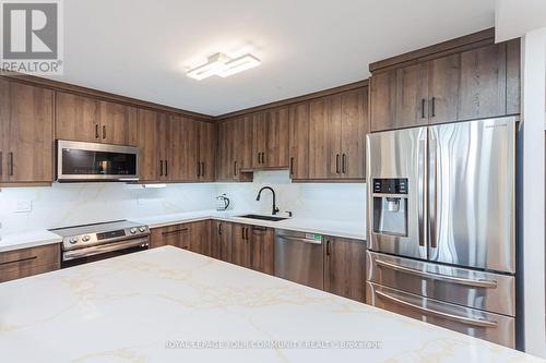 803 - 55 Bamburgh Circle, Toronto (Steeles), ON - Indoor Photo Showing Kitchen With Upgraded Kitchen