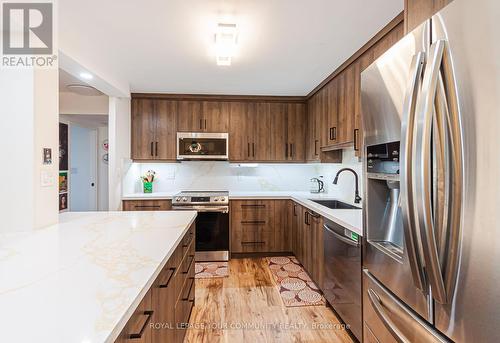 803 - 55 Bamburgh Circle, Toronto (Steeles), ON - Indoor Photo Showing Kitchen With Upgraded Kitchen