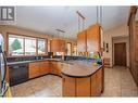 605 Larkspur, Vernon, BC  - Indoor Photo Showing Kitchen With Double Sink 