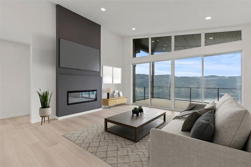 8820 Oxford Road, Vernon, BC - Indoor Photo Showing Living Room With Fireplace