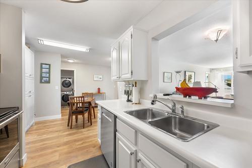 207-1329 Klo Road, Kelowna, BC - Indoor Photo Showing Kitchen With Double Sink