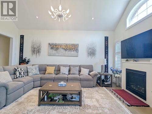 23 Higham Place, Clarington (Bowmanville), ON - Indoor Photo Showing Living Room With Fireplace