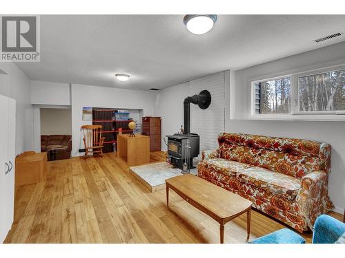 1380 Orion Road, Prince George, BC - Indoor Photo Showing Living Room With Fireplace