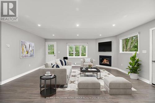 3554 John Street, Ramara (Brechin), ON - Indoor Photo Showing Living Room With Fireplace