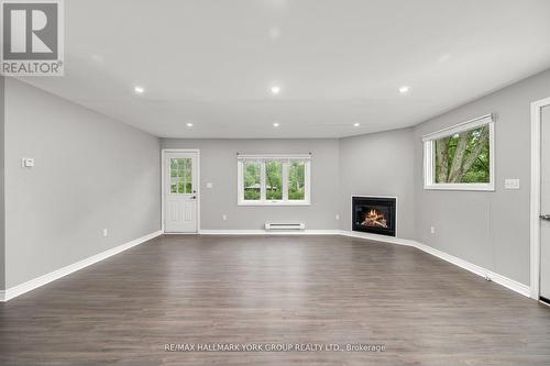 3554 John Street, Ramara (Brechin), ON - Indoor Photo Showing Other Room With Fireplace