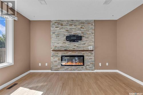 411 Blackshire Crescent, Saskatoon, SK - Indoor Photo Showing Living Room With Fireplace