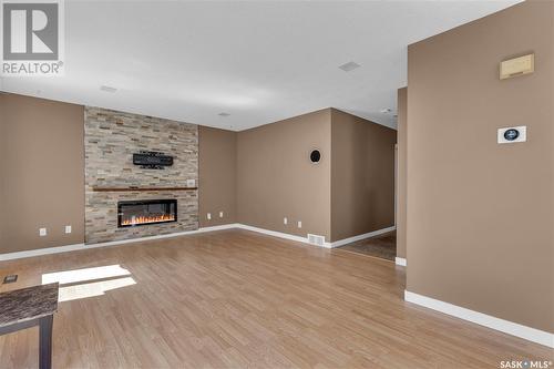 411 Blackshire Crescent, Saskatoon, SK - Indoor Photo Showing Other Room With Fireplace