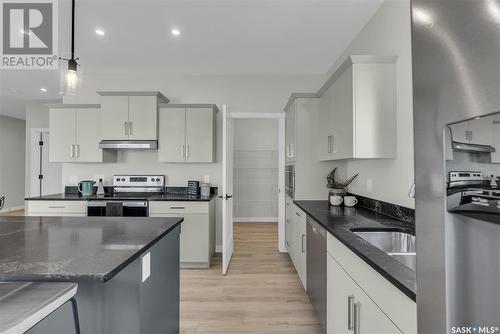 340 Leskiw Bend, Saskatoon, SK - Indoor Photo Showing Kitchen With Upgraded Kitchen