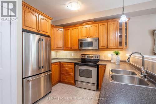 14 - 2165 Itabashi Way, Burlington (Tansley), ON - Indoor Photo Showing Kitchen With Double Sink