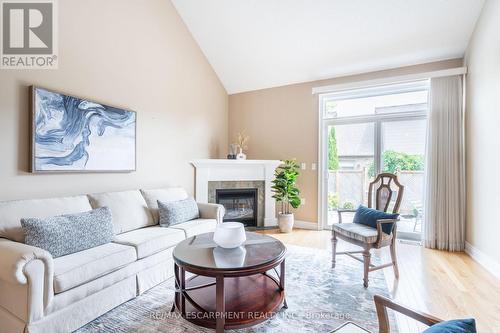 14 - 2165 Itabashi Way, Burlington (Tansley), ON - Indoor Photo Showing Living Room With Fireplace