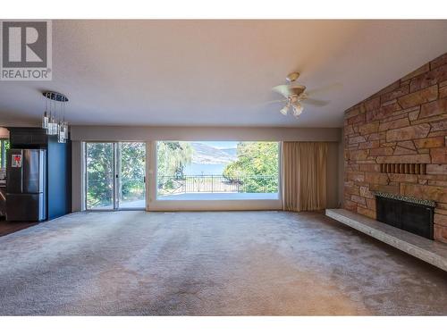 102 Derenzy Place, Penticton, BC - Indoor Photo Showing Living Room With Fireplace