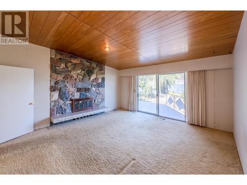 102 Derenzy Place, Penticton, BC - Indoor Photo Showing Other Room With Fireplace